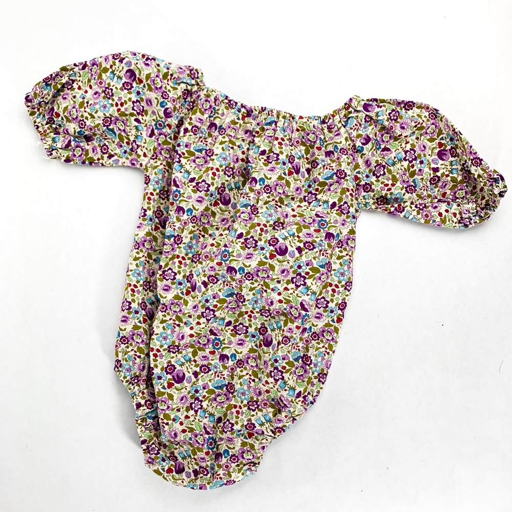 Batel’s floral purple Boho Onesie